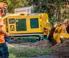 Up close Rayco Stump Cutter for Sale,Rayco Stump Cutter working by a house,New Rayco Stump Cutter for Sale